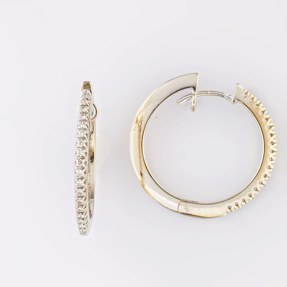 Серьги конго с бриллиантом из белого золота 750 пробы