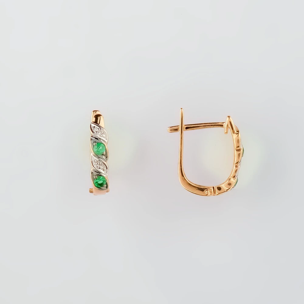Серьги с изумрудом из красного золота 585 пробы