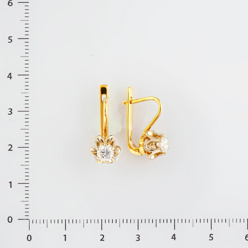 Серьги с бриллиантом из желтого золота 750 пробы