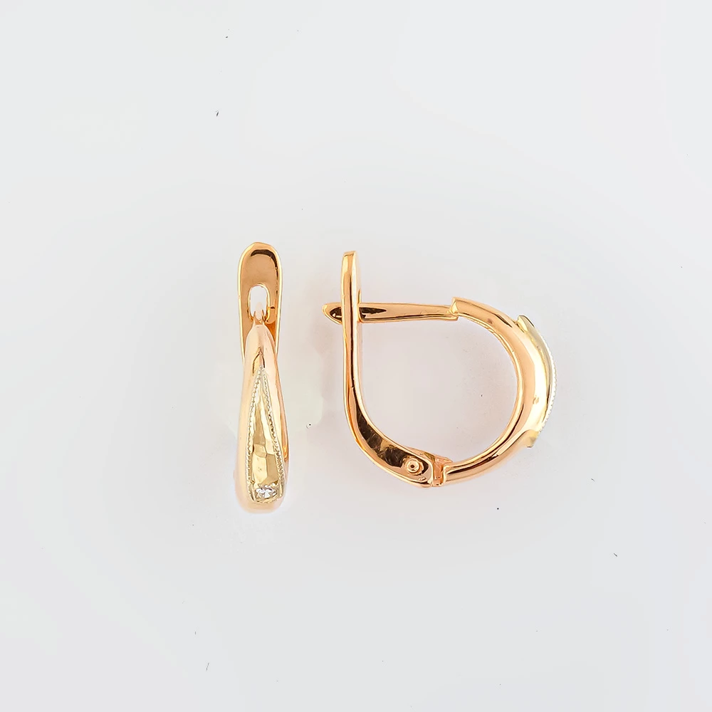 Серьги с бриллиантом из красного золота 585 пробы