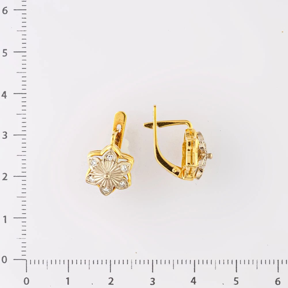 Серьги с бриллиантом из желтого золота 750 пробы