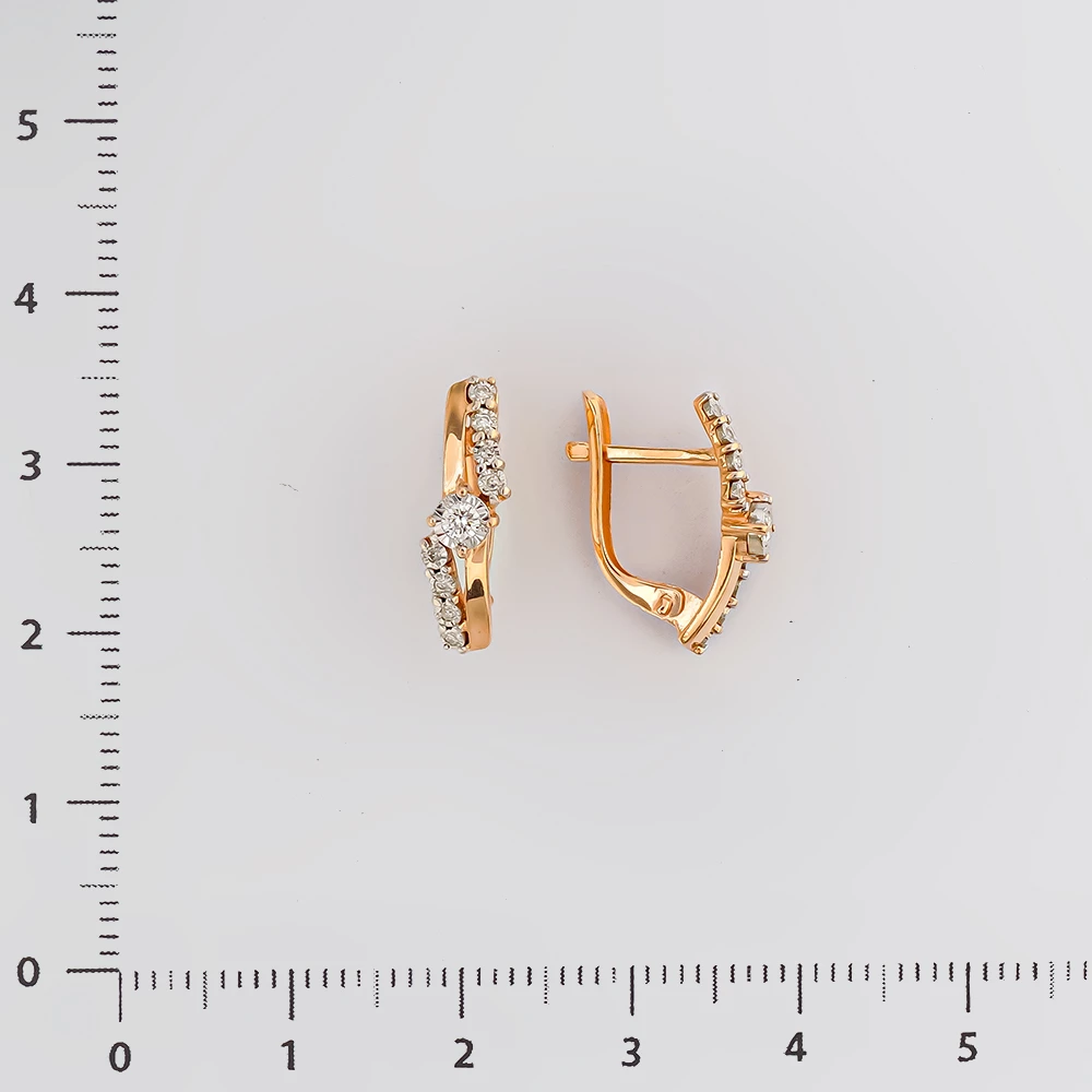 Серьги с бриллиантом из красного золота 585 пробы