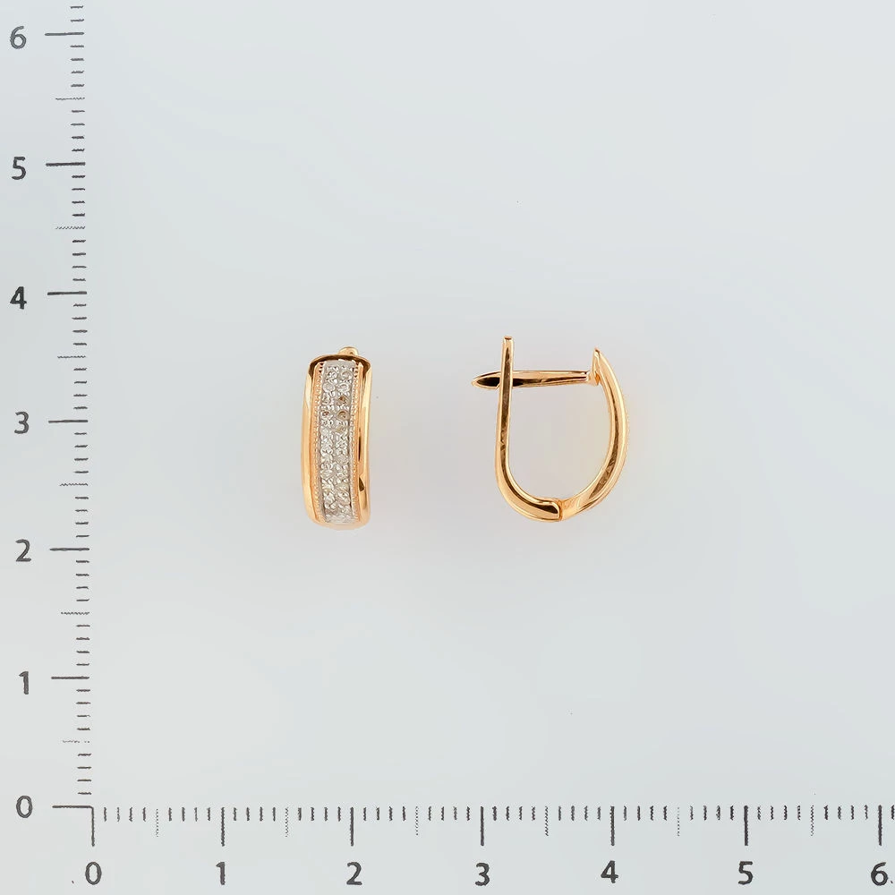 Серьги с бриллиантом из красного золота 585 пробы