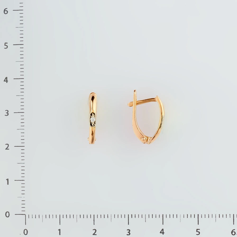 Серьги с бриллиантом из красного золота 585 пробы