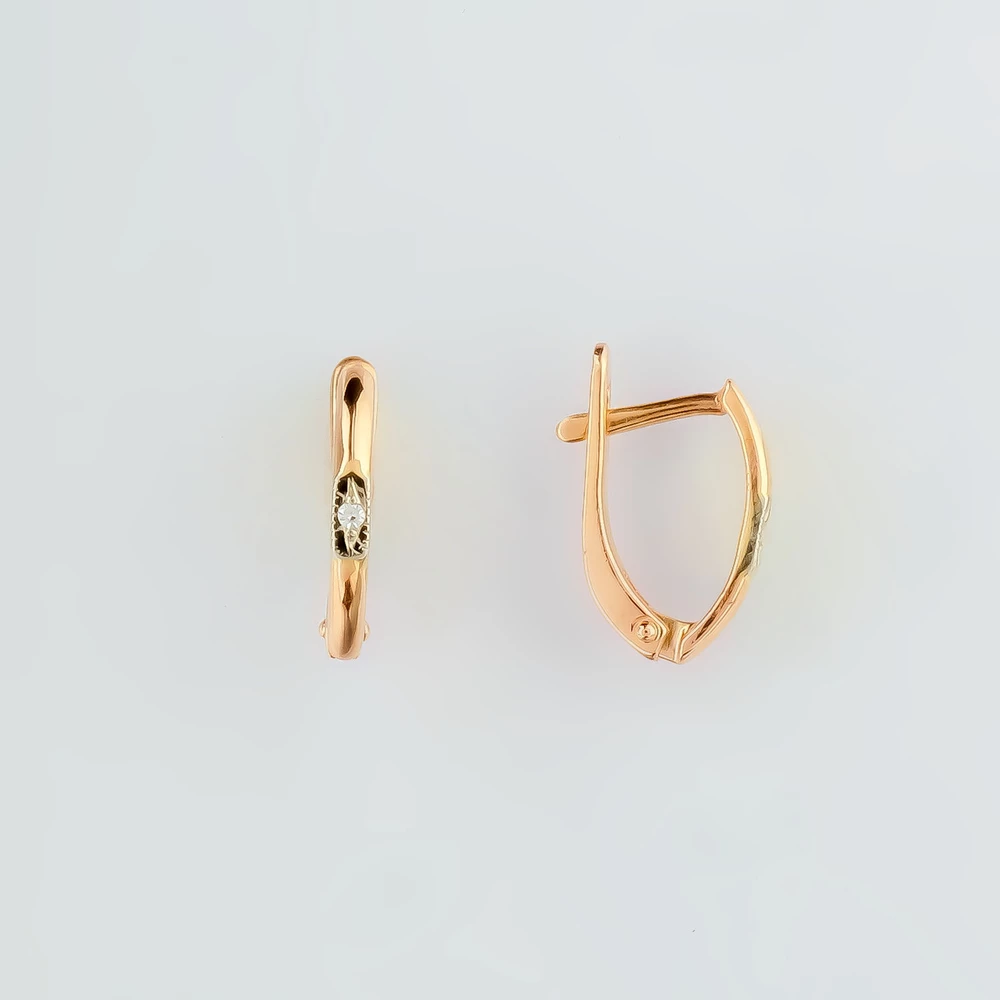 Серьги с бриллиантом из красного золота 585 пробы