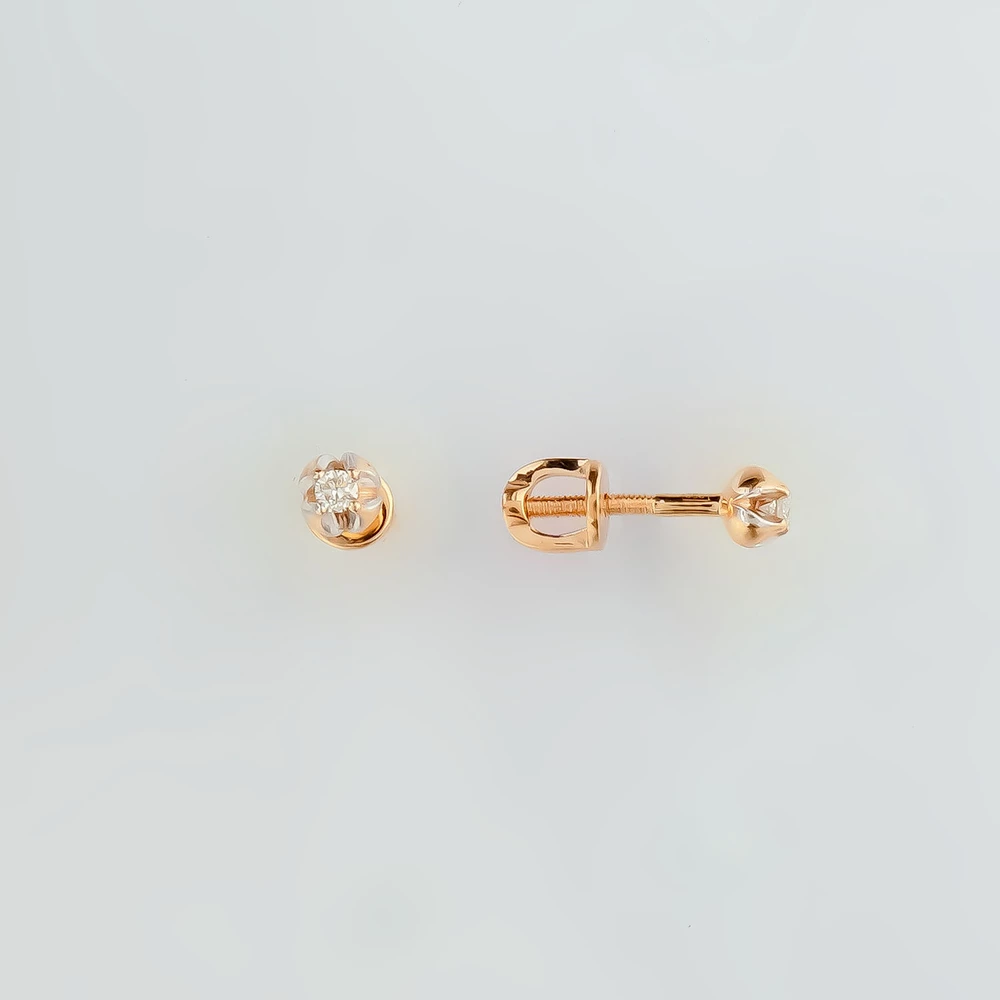 Серьги с бриллиантом из красного золота 585 пробы