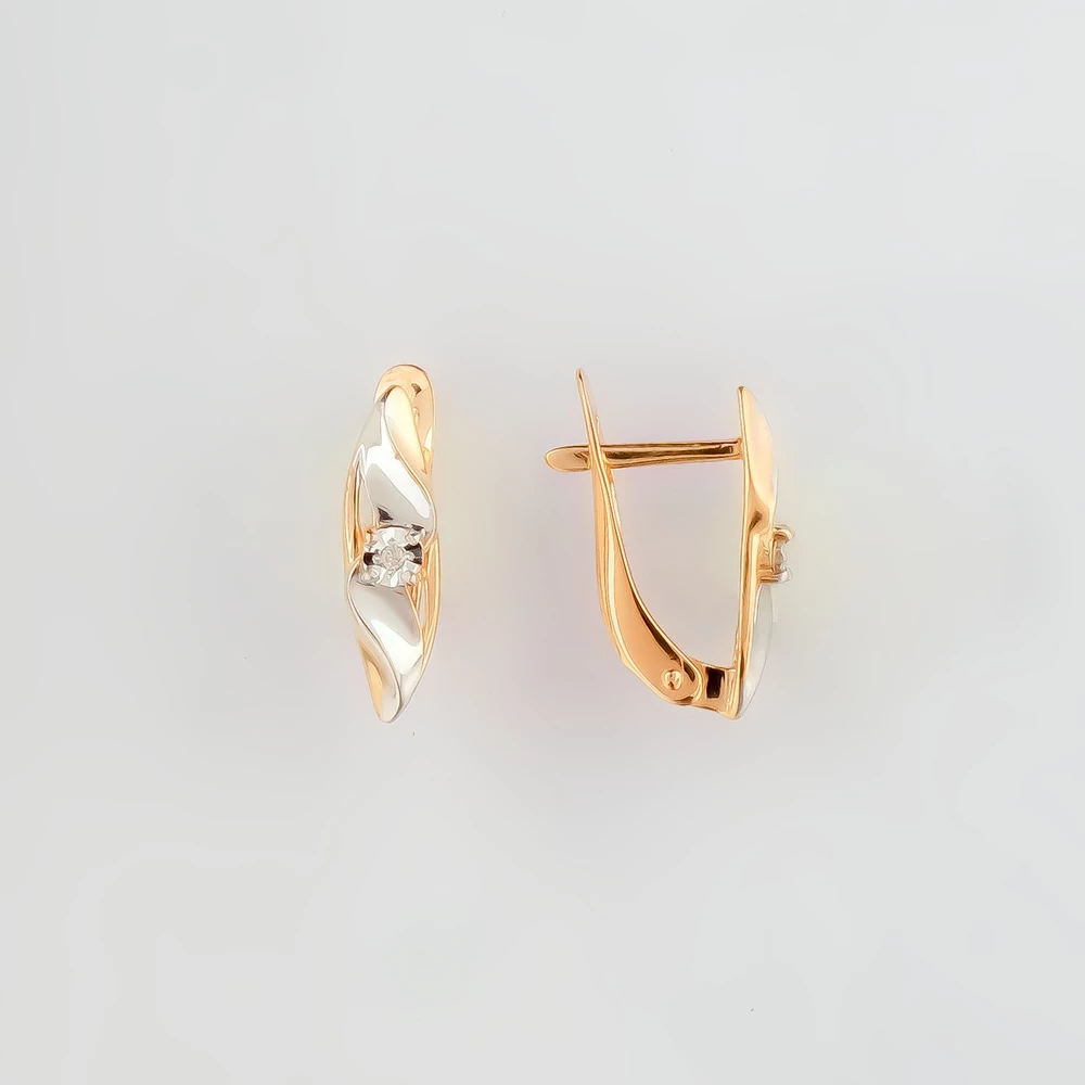 Серьги с бриллиантом из красного золота 585 пробы