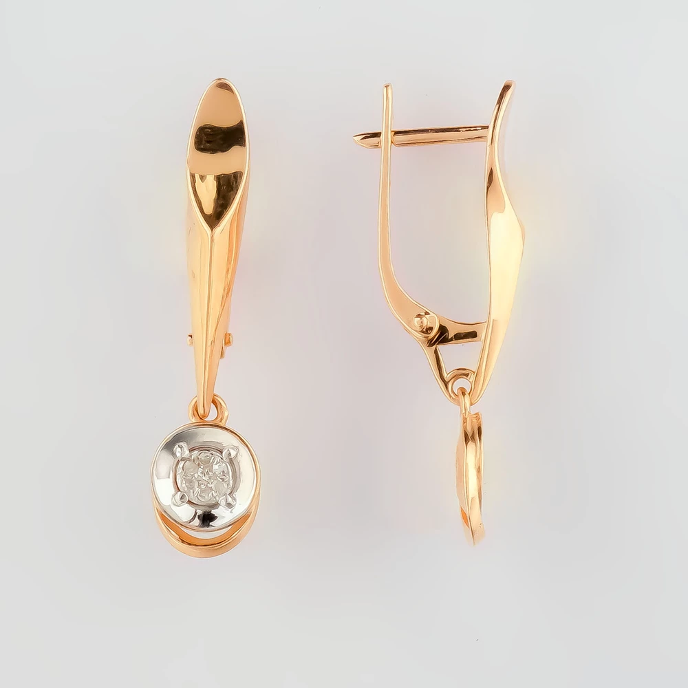 Серьги с бриллиантом из красного золота 585 пробы