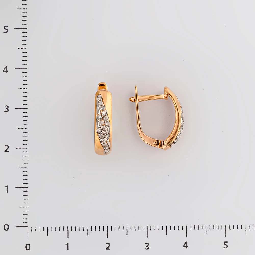 Серьги с бриллиантом из красного золота 585 пробы