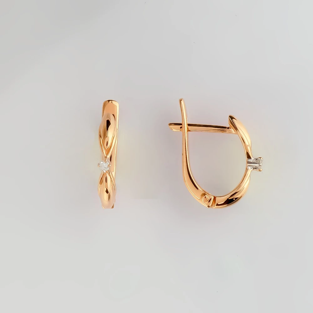 Серьги с бриллиантом из красного золота 585 пробы