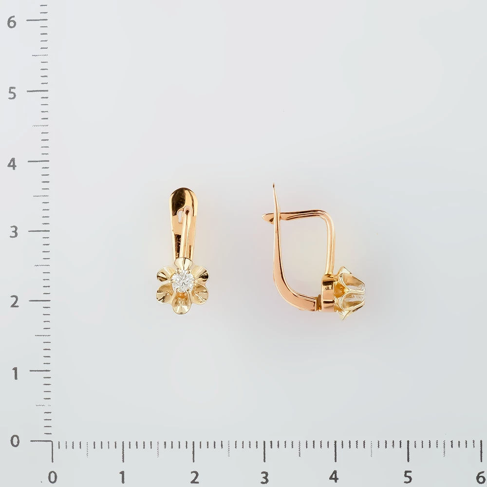 Серьги с бриллиантом из красного золота 583 пробы