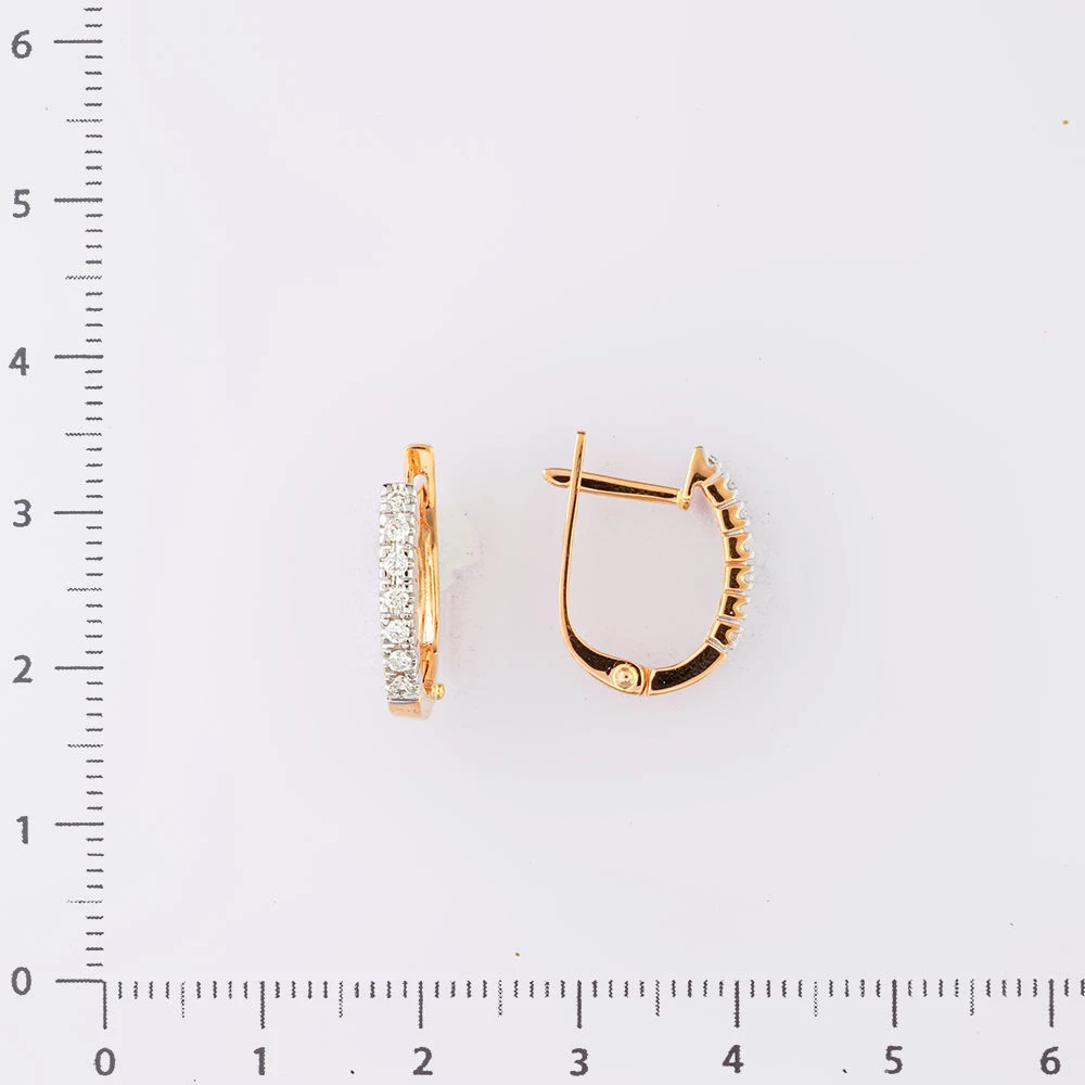 Серьги с бриллиантом из красного золота 585 пробы
