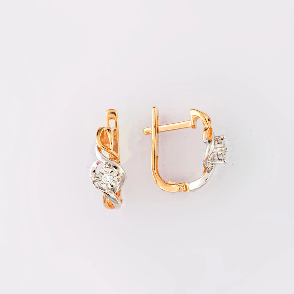 Серьги с бриллиантом из красного золота 585 пробы