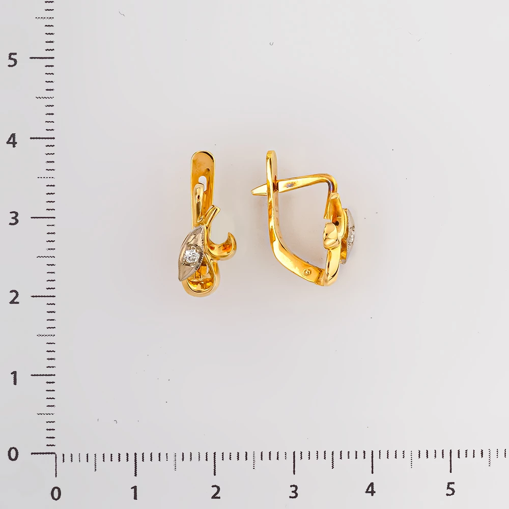 Серьги с бриллиантом из желтого золота 750 пробы