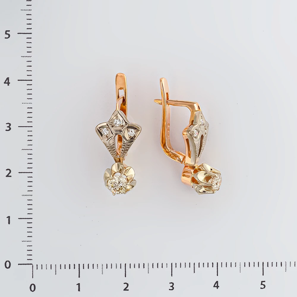Серьги с бриллиантом из красного золота 585 пробы