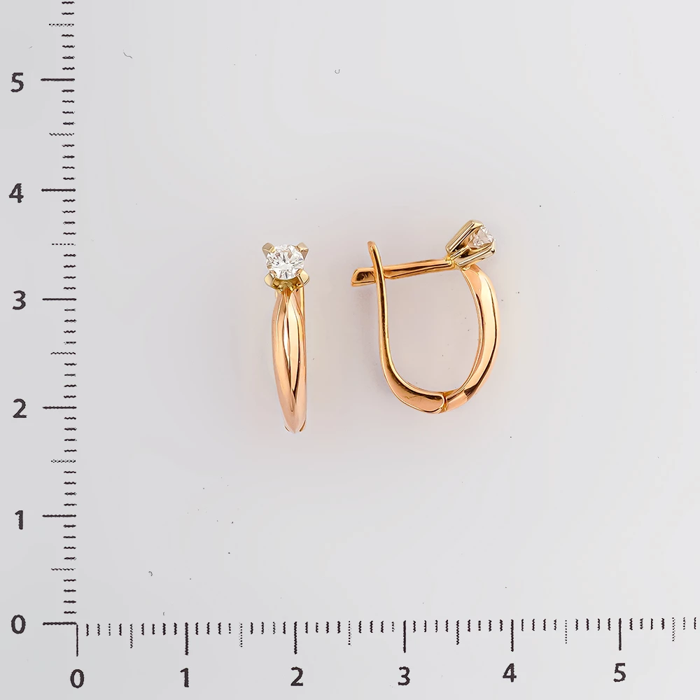 Серьги с бриллиантом из красного золота 585 пробы