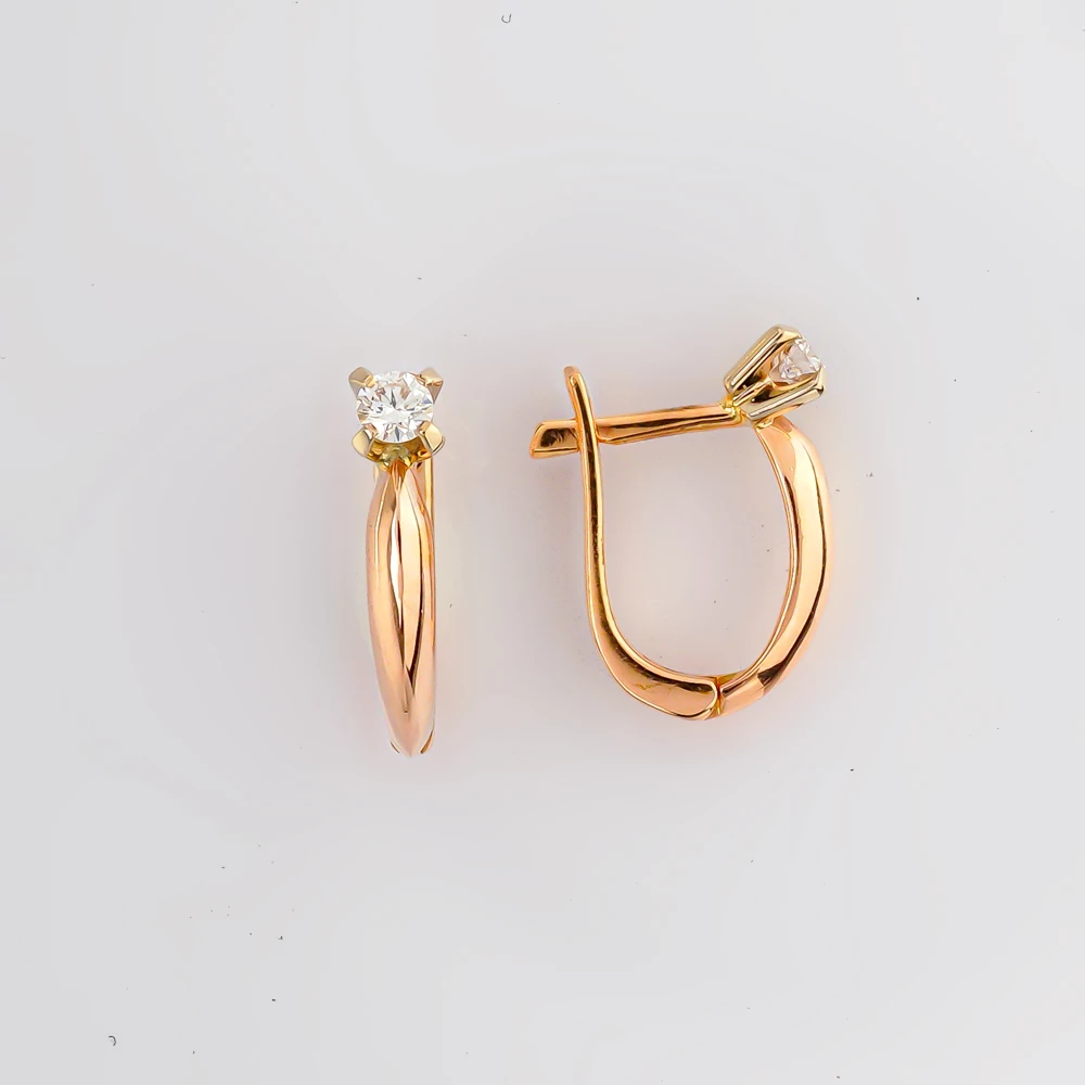 Серьги с бриллиантом из красного золота 585 пробы