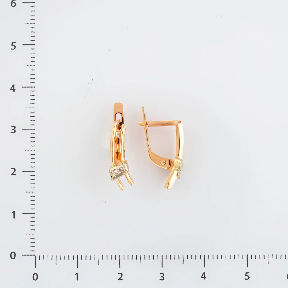 Серьги с бриллиантом из красного золота 585 пробы