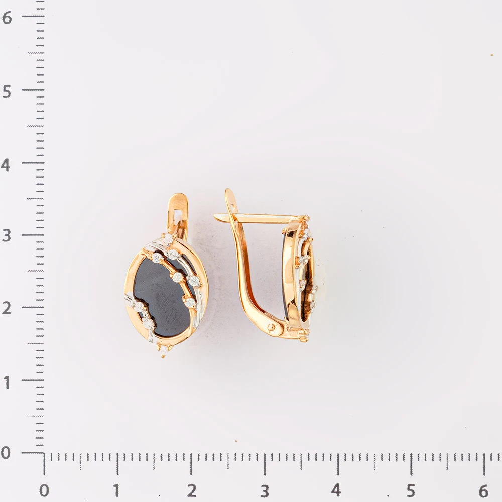 Серьги с ониксом из красного золота 585 пробы