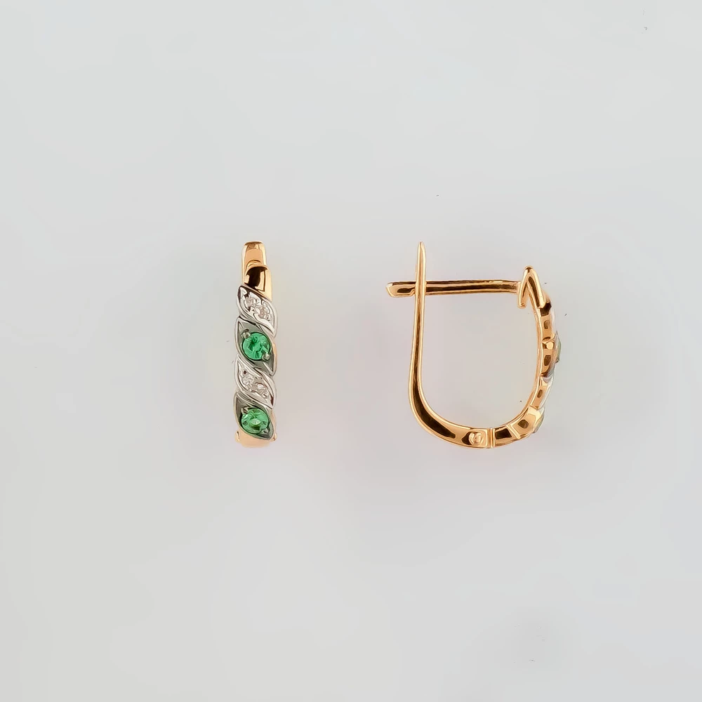Серьги с изумрудом из красного золота 585 пробы