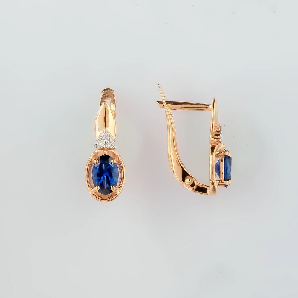 Серьги с сапфиром синтетическим из красного золота 375 пробы