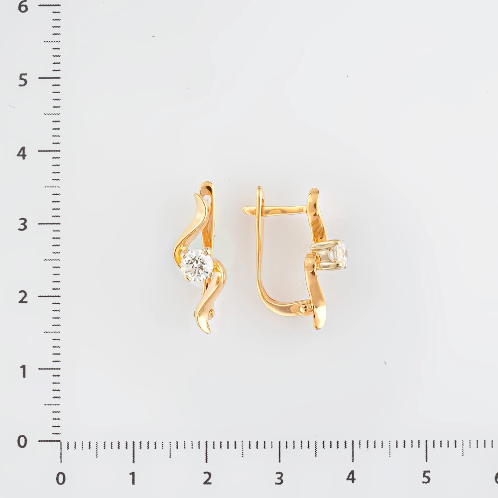 Серьги с бриллиантом из красного золота 585 пробы