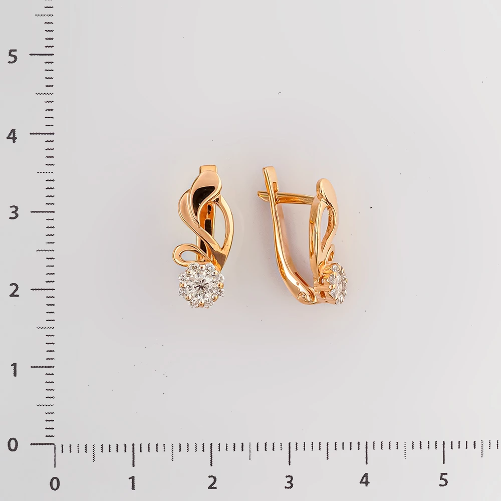 Серьги с бриллиантом из красного золота 585 пробы