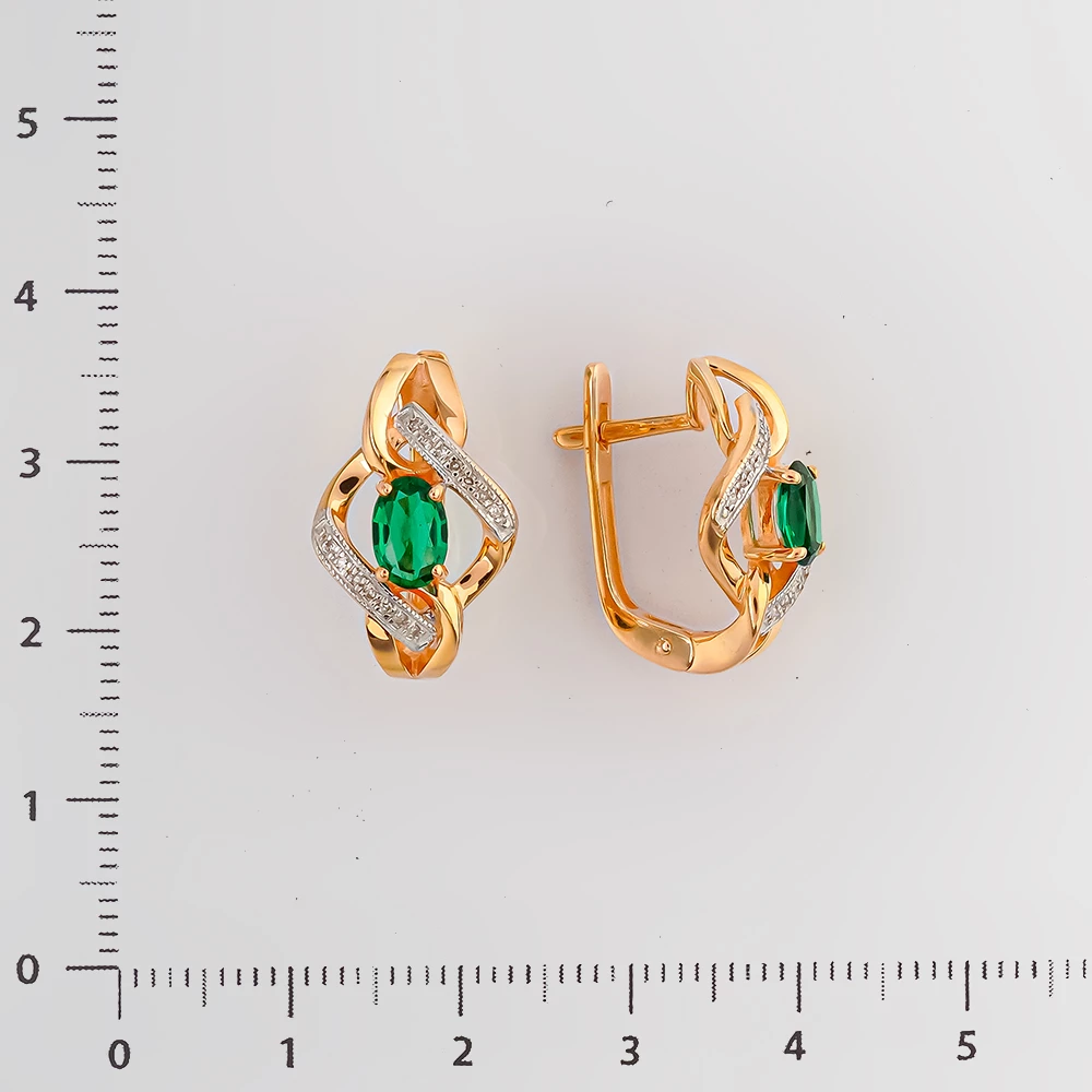 Серьги с изумрудом синтетическим из красного золота 585 пробы Серьги с изумрудом синтетическим из красного золота 585 пробы