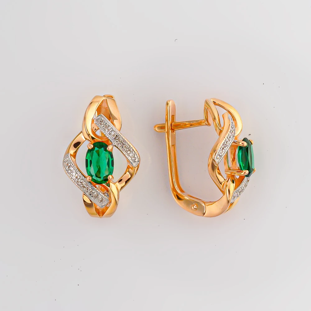 Серьги с изумрудом синтетическим из красного золота 585 пробы Серьги с изумрудом синтетическим из красного золота 585 пробы