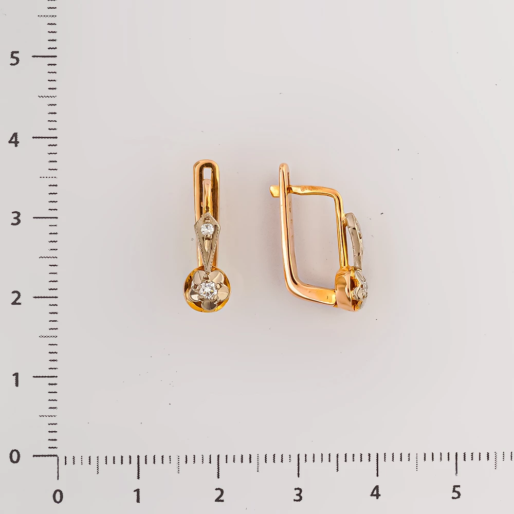 Серьги с бриллиантом из красного золота 583 пробы