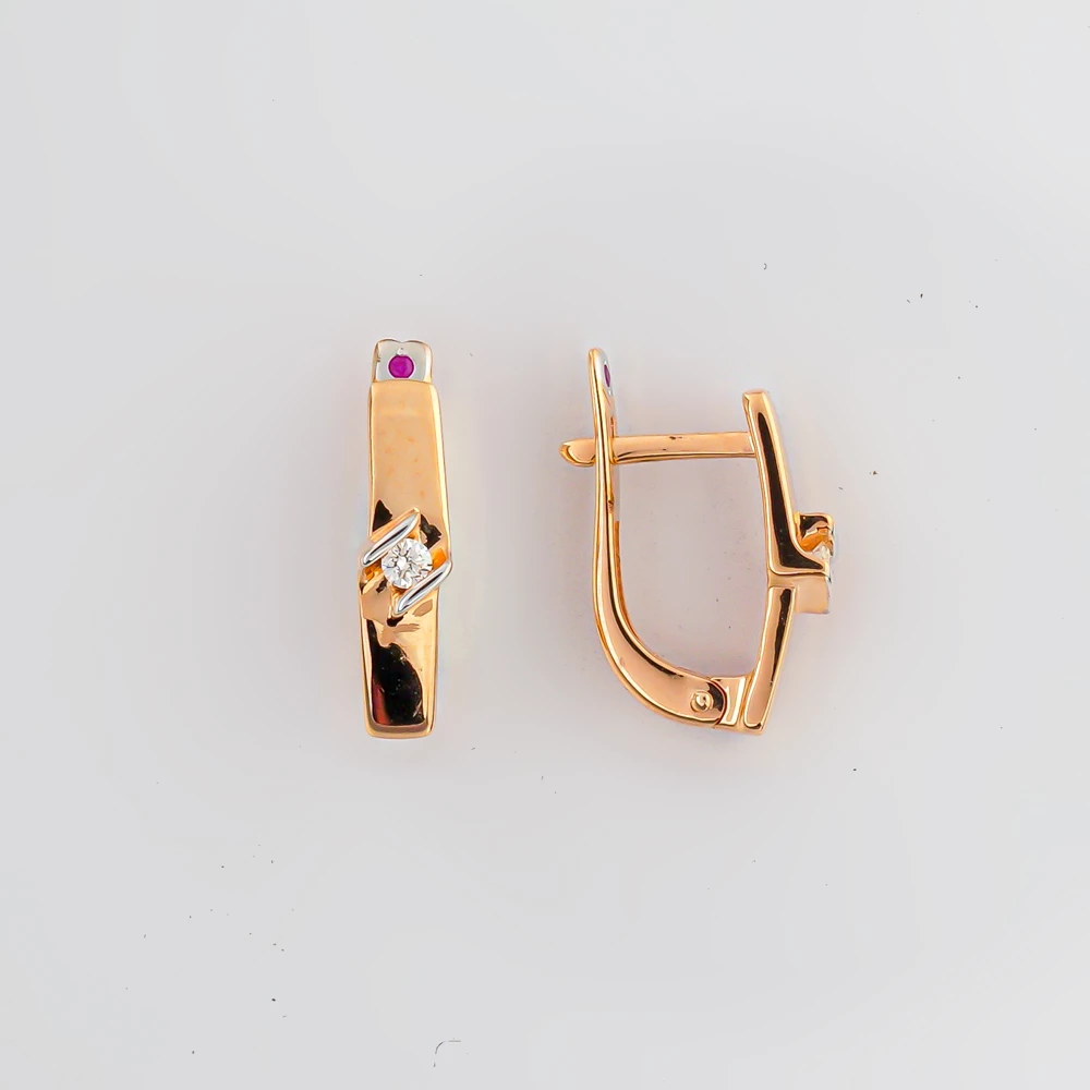 Серьги с бриллиантом из красного золота 585 пробы