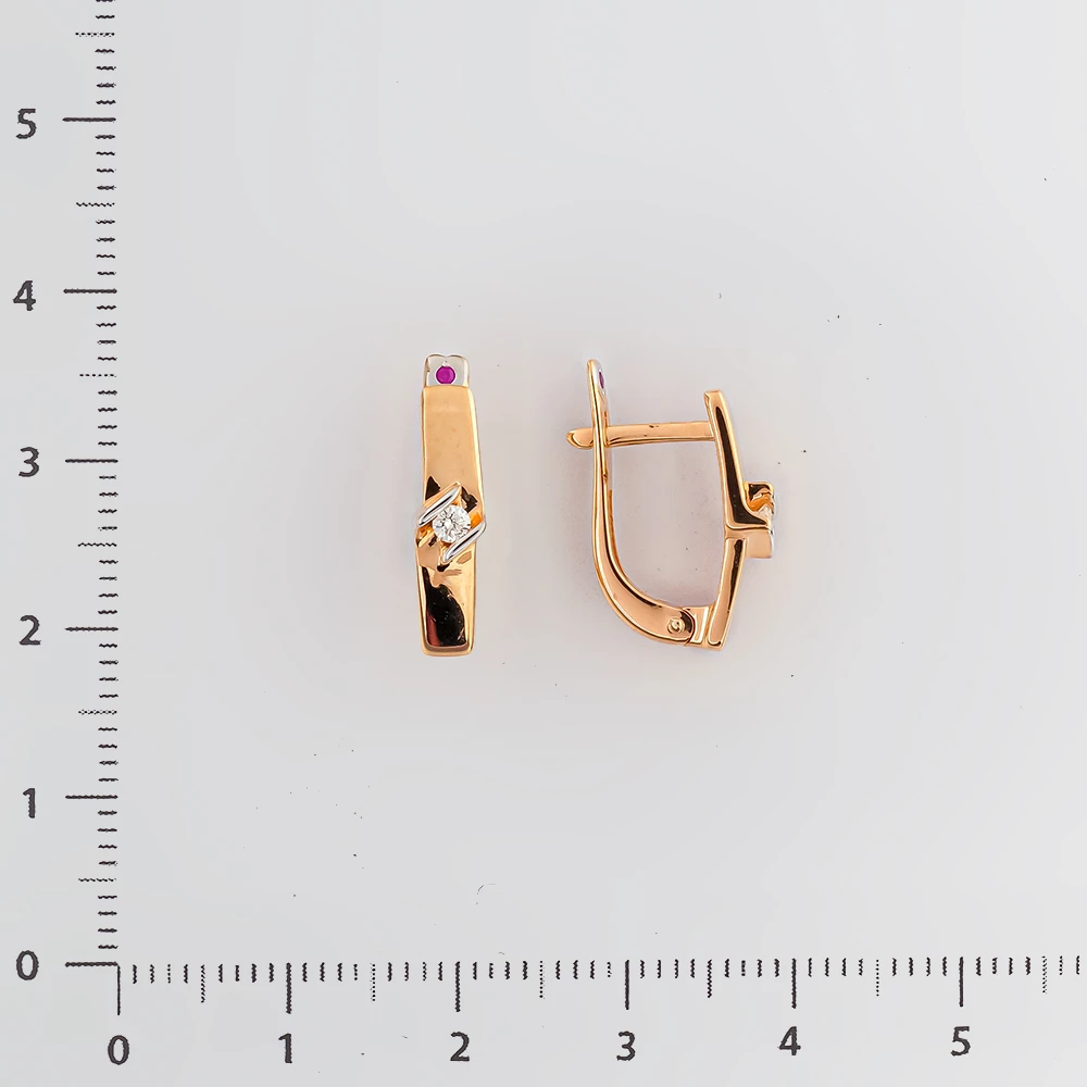 Серьги с бриллиантом из красного золота 585 пробы