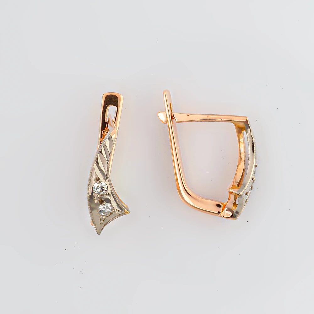 Серьги с бриллиантом из красного золота 583 пробы