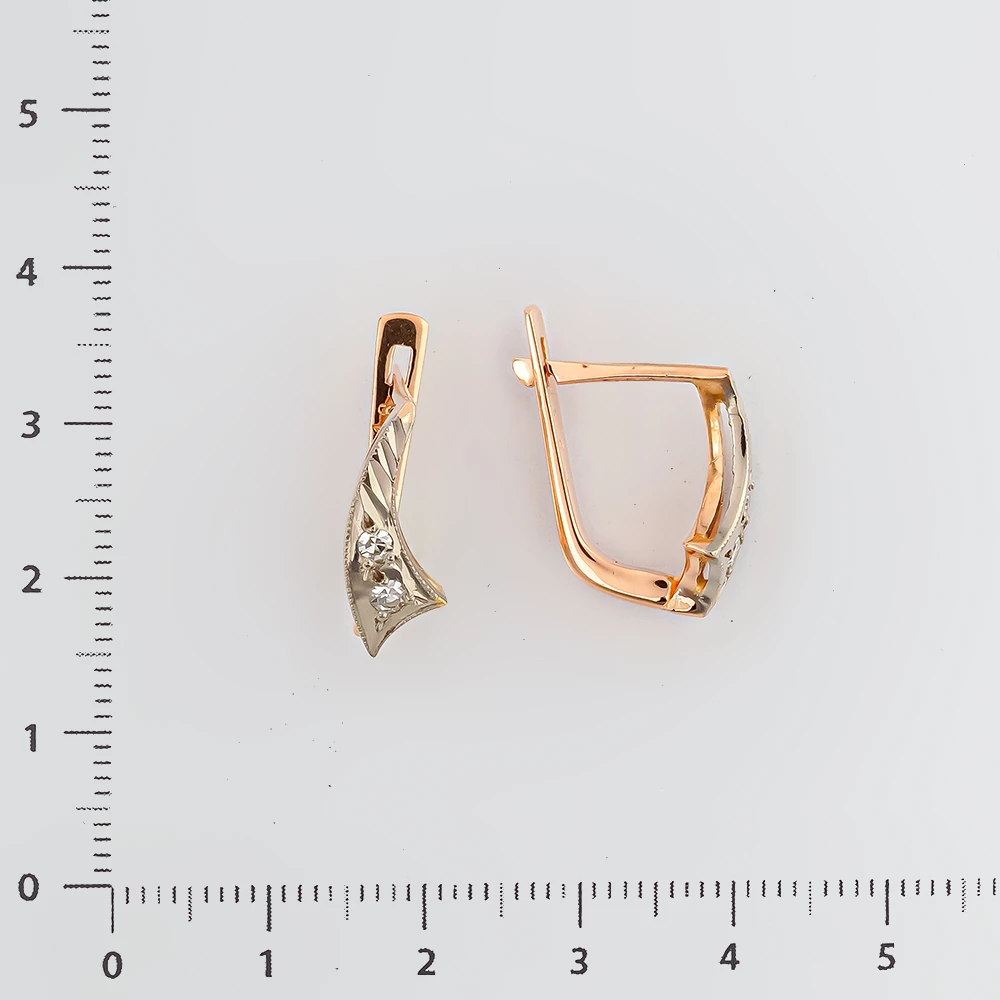 Серьги с бриллиантом из красного золота 583 пробы