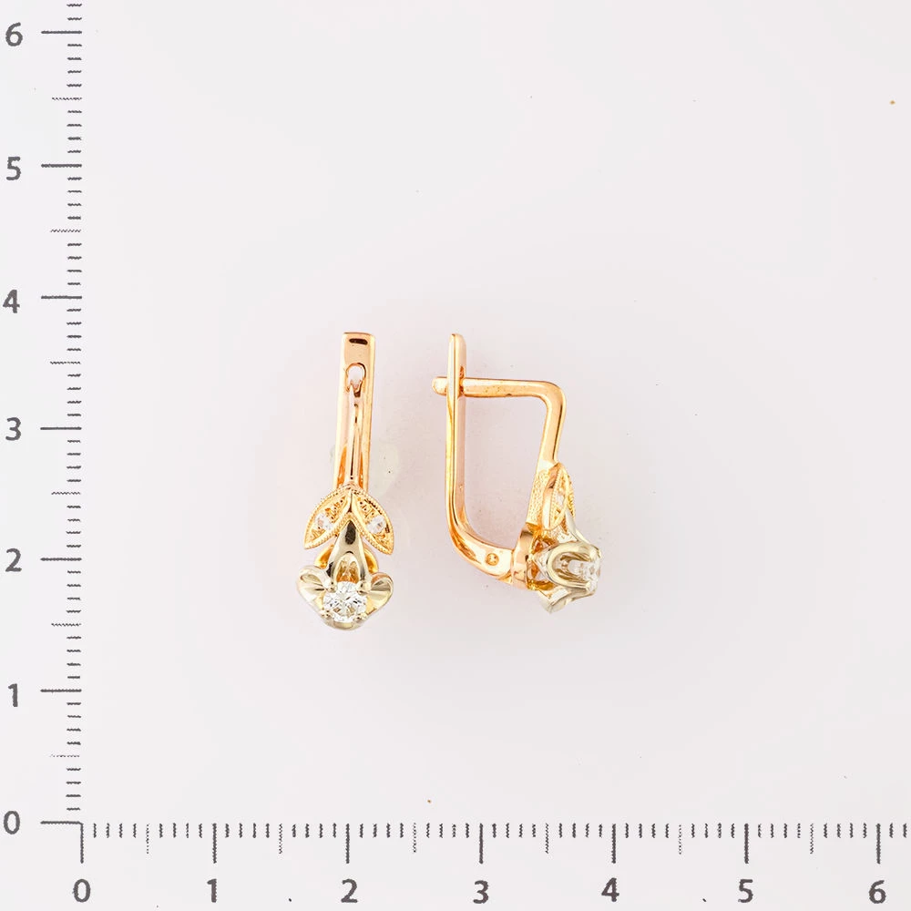 Серьги с бриллиантом из красного золота 583 пробы