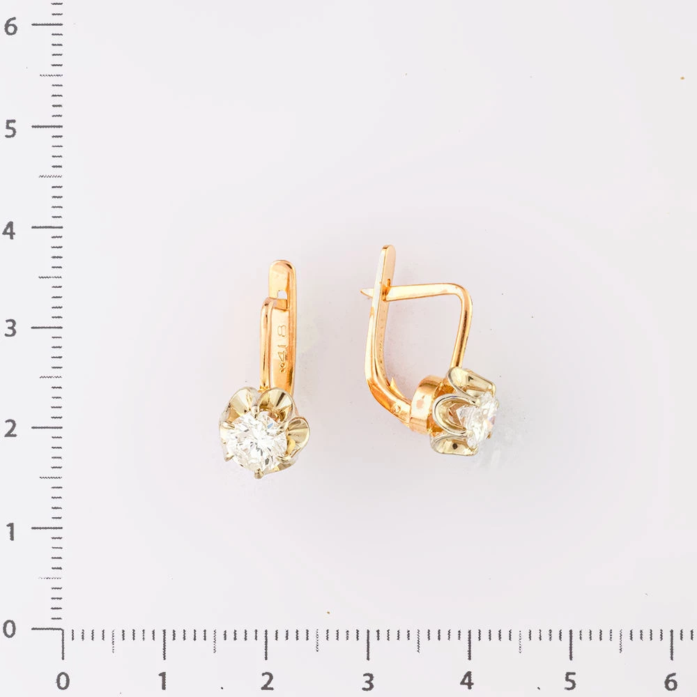 Серьги с бриллиантом из красного золота 583 пробы