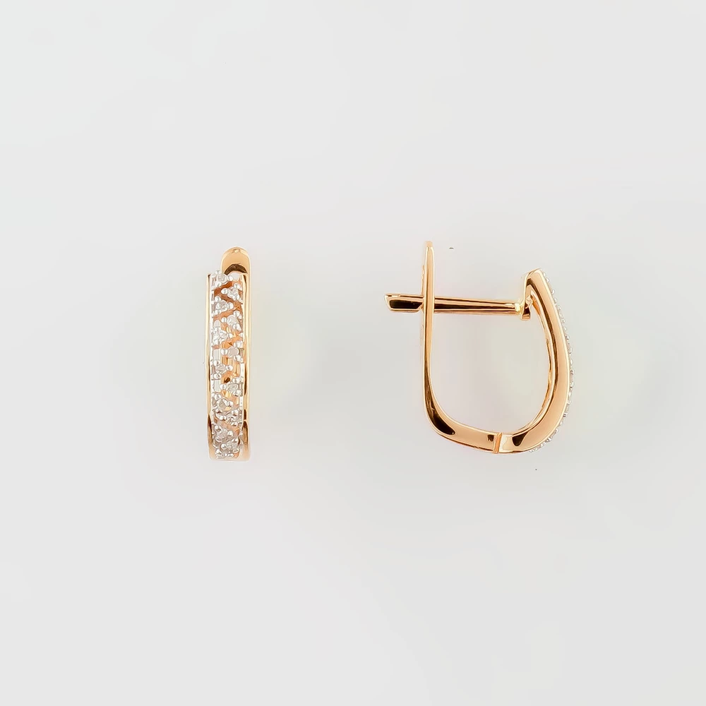 Серьги с бриллиантом из красного золота 585 пробы