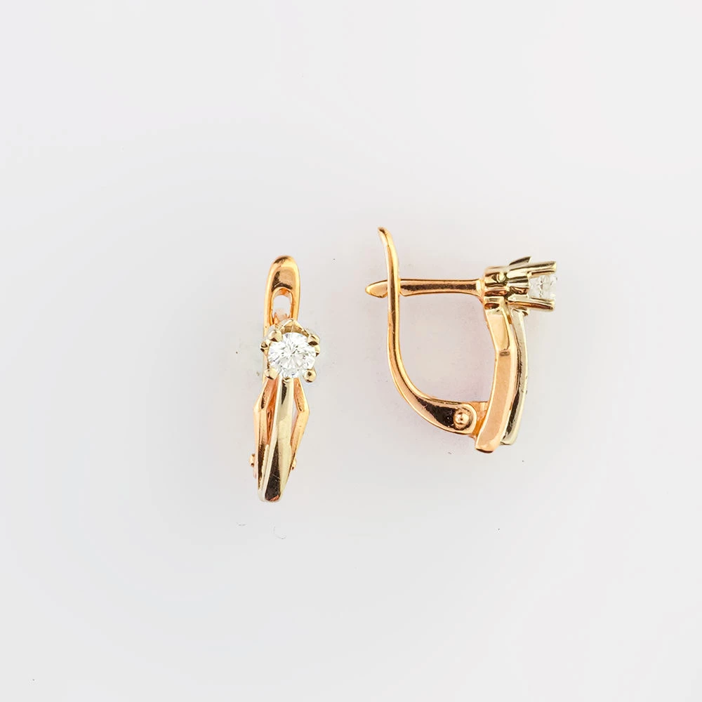 Серьги с бриллиантом из красного золота 585 пробы