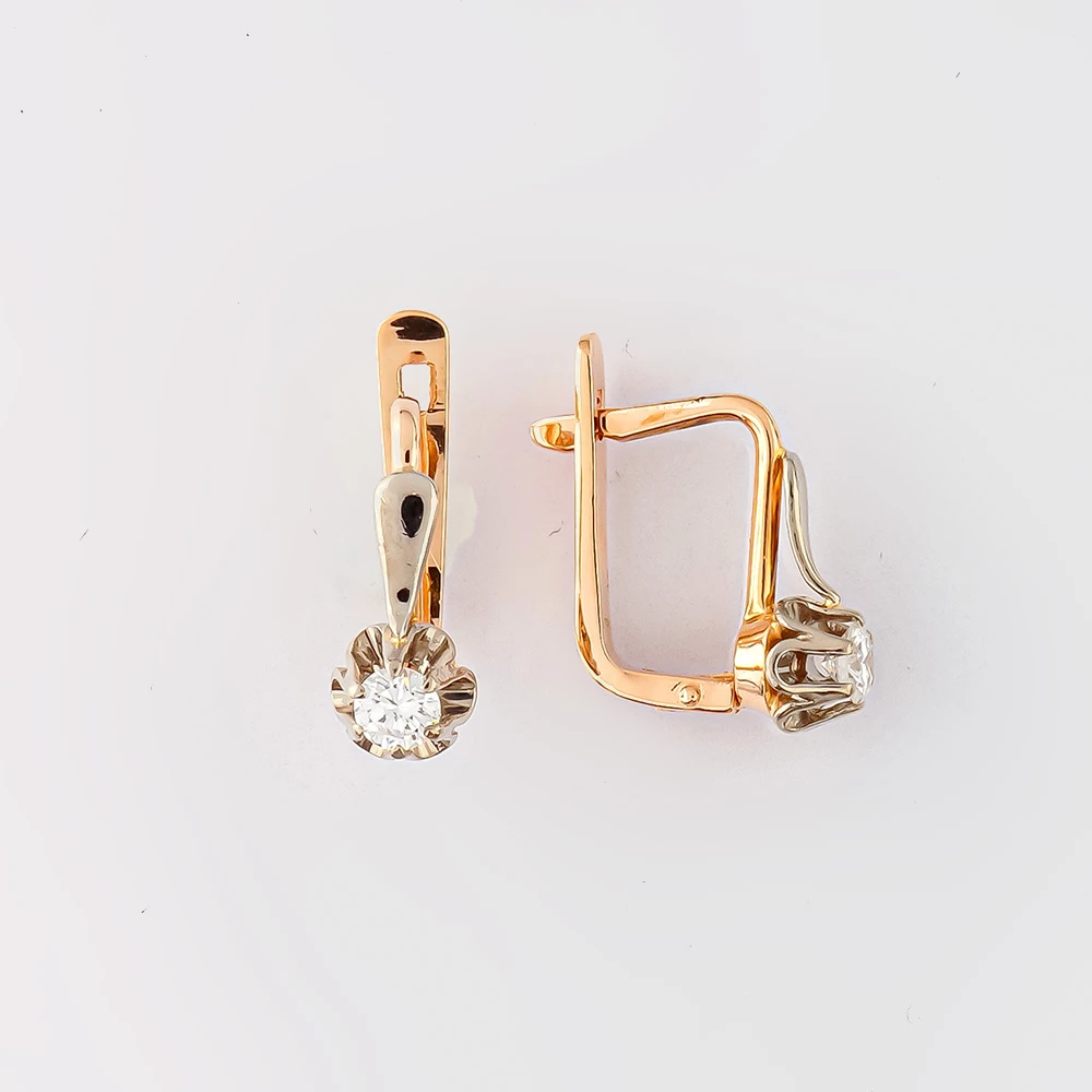 Серьги с бриллиантом из красного золота 583 пробы