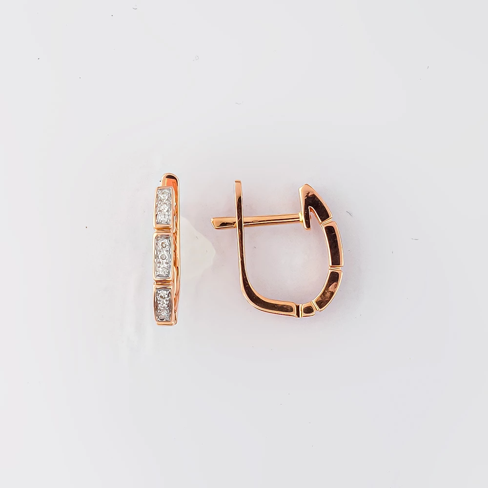 Серьги с бриллиантом из красного золота 585 пробы