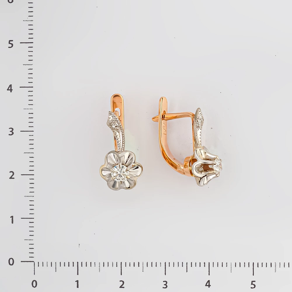 Серьги с бриллиантом из красного золота 583 пробы