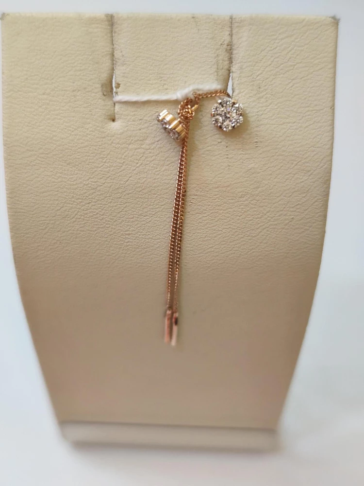 Серьги-продевки с фианитом из красного золота 585 пробы