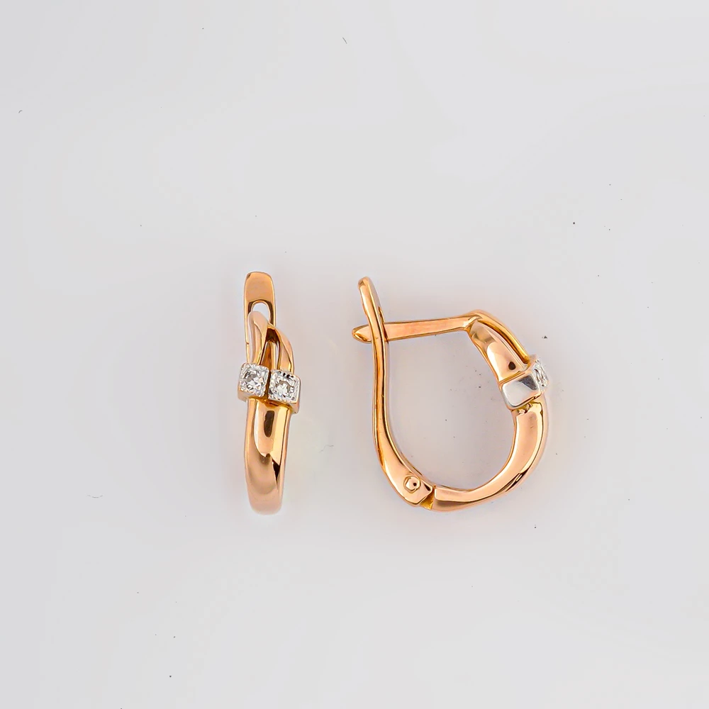 Серьги с бриллиантом из красного золота 585 пробы