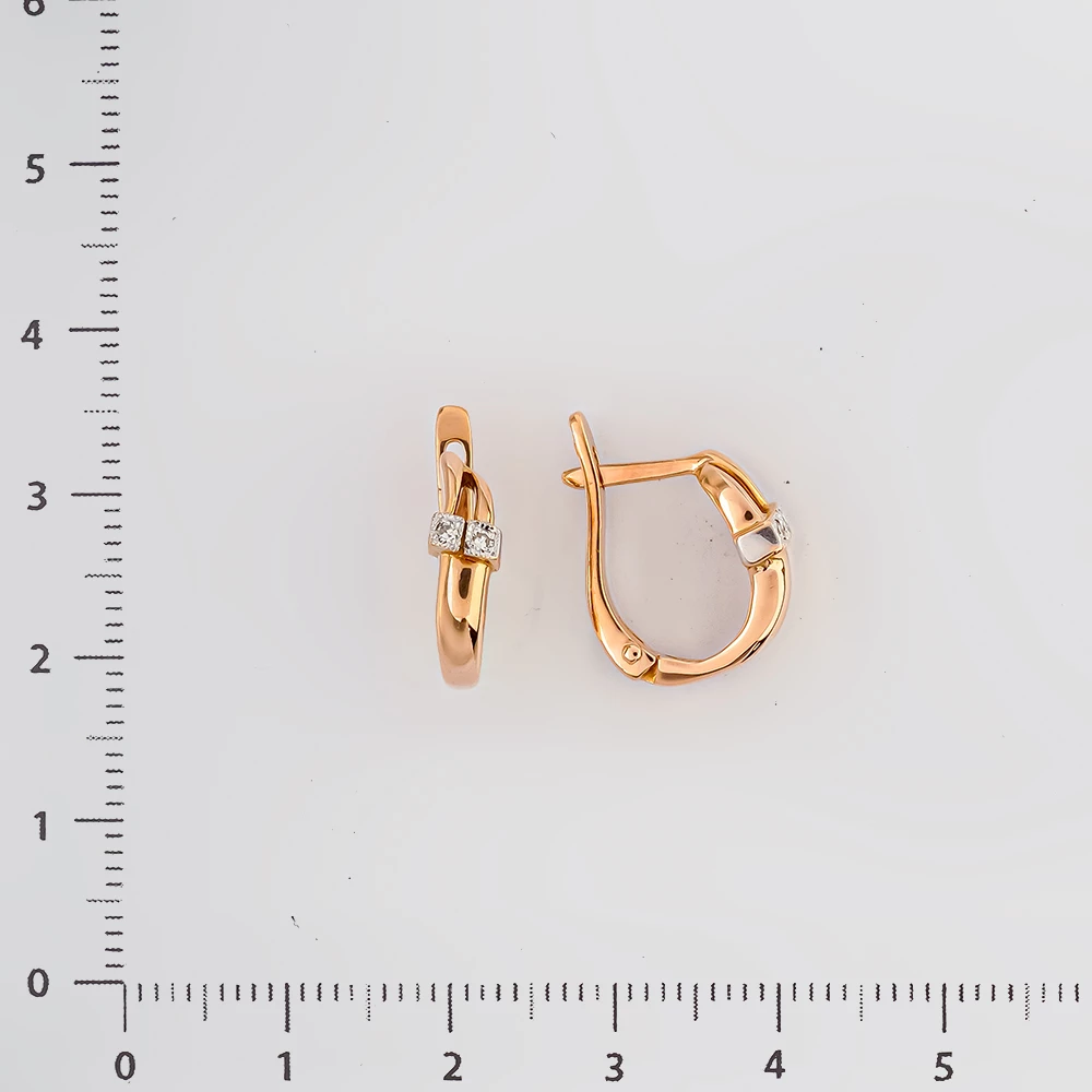 Серьги с бриллиантом из красного золота 585 пробы