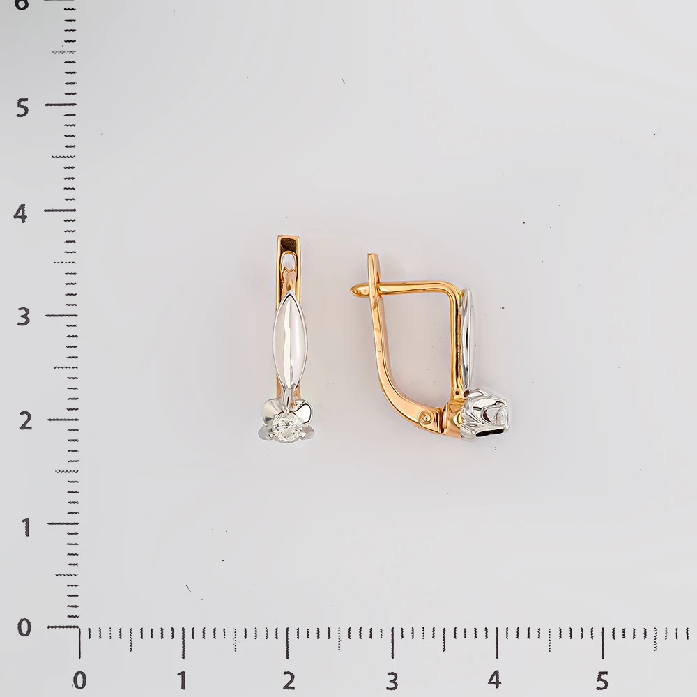 Серьги с бриллиантом из красного золота 585 пробы