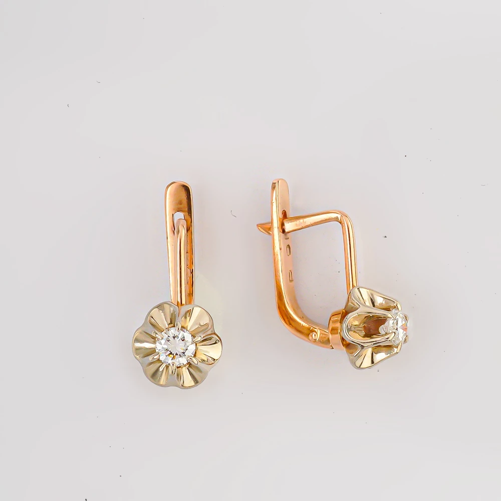 Серьги с бриллиантом из красного золота 583 пробы