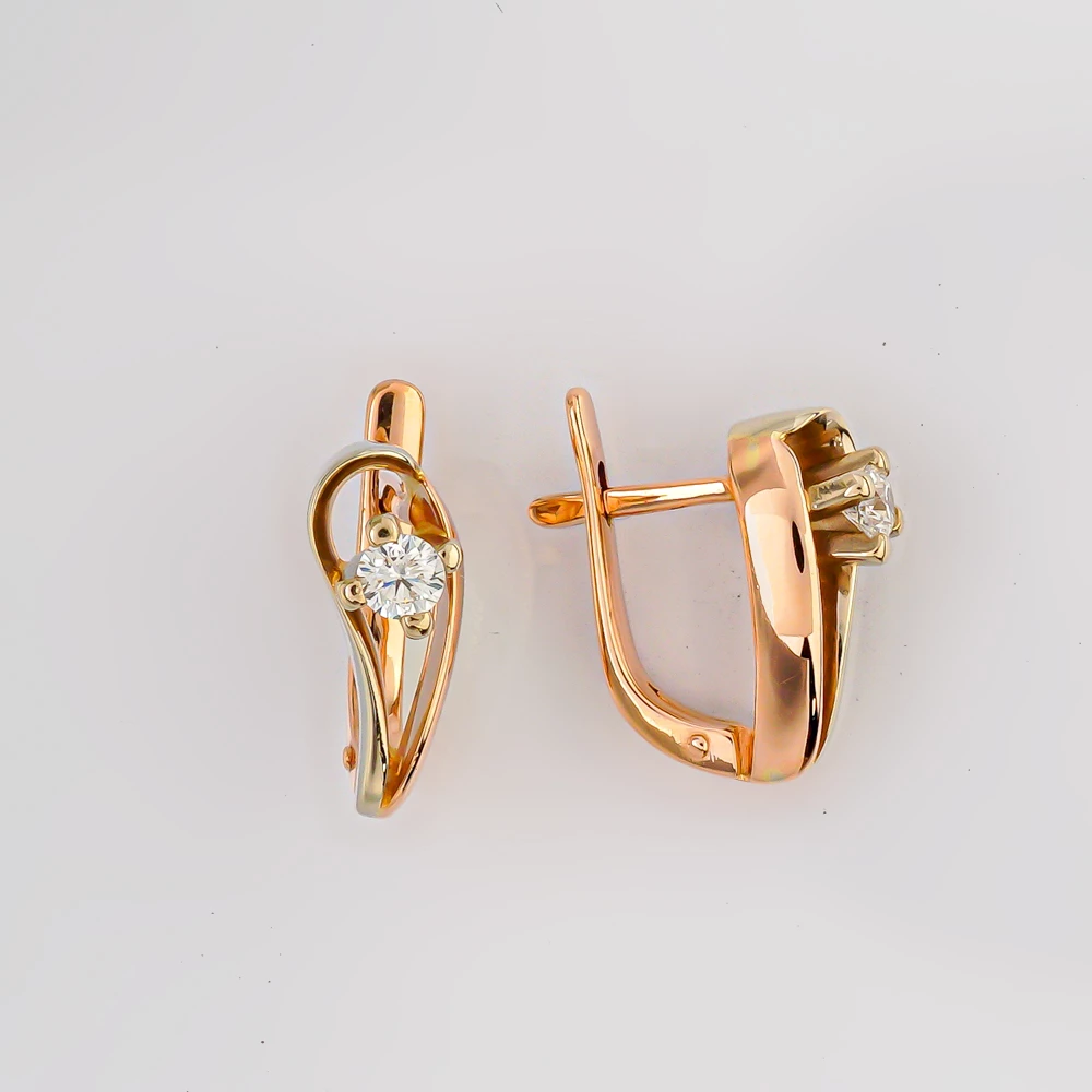 Серьги с бриллиантом из красного золота 585 пробы