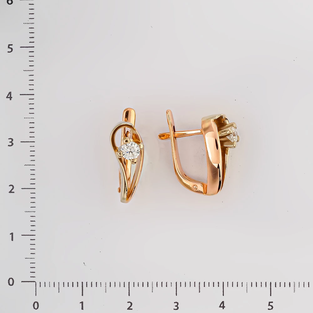 Серьги с бриллиантом из красного золота 585 пробы