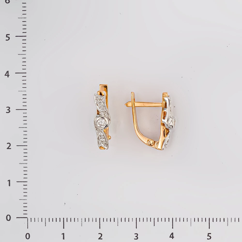 Серьги с бриллиантом из красного золота 585 пробы