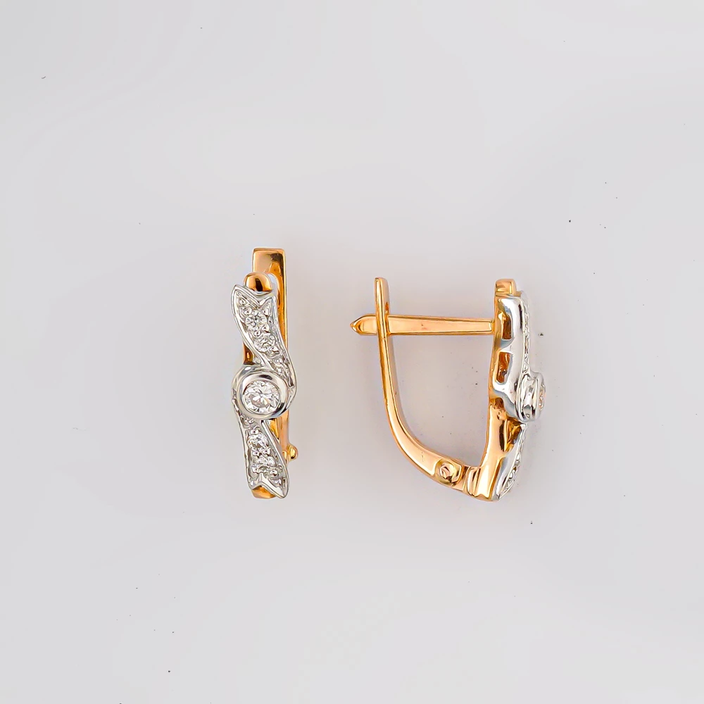 Серьги с бриллиантом из красного золота 585 пробы